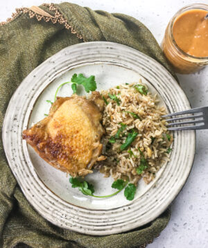 Dutch Oven Chicken and Rice with Spicy Peanut Sauce